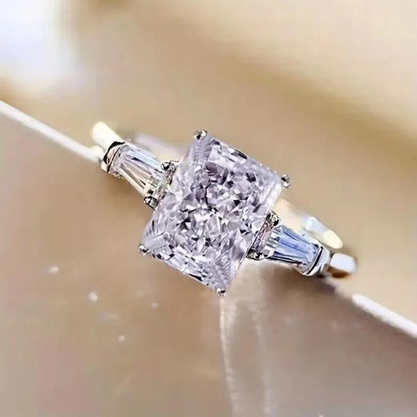 Radiant Cut Three-Stone Ring with Tapered Baguettes