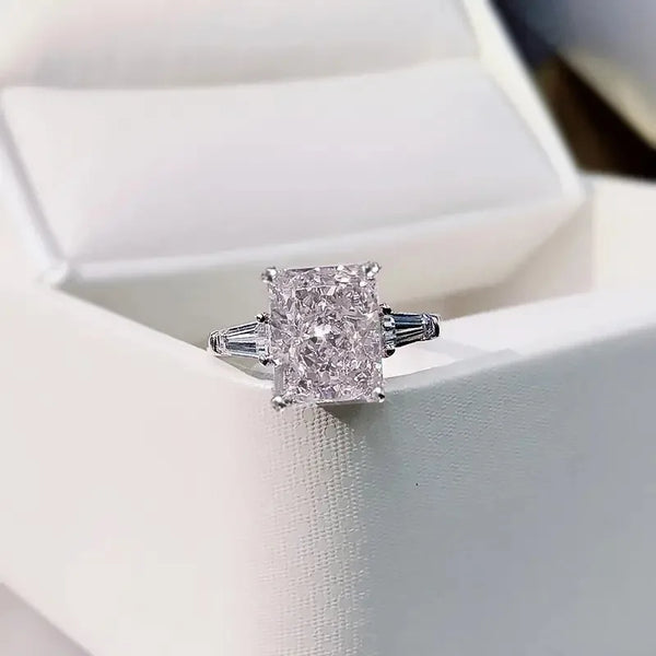 Radiant Cut Three-Stone Ring with Tapered Baguettes