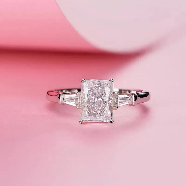 Radiant Cut Three-Stone Ring with Tapered Baguettes