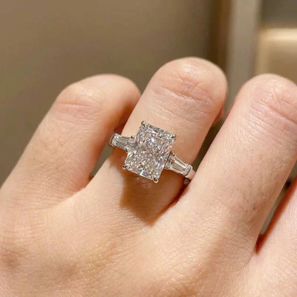 Radiant Cut Three-Stone Ring with Tapered Baguettes