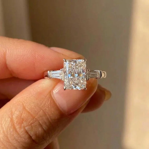 Radiant Cut Three-Stone Ring with Tapered Baguettes